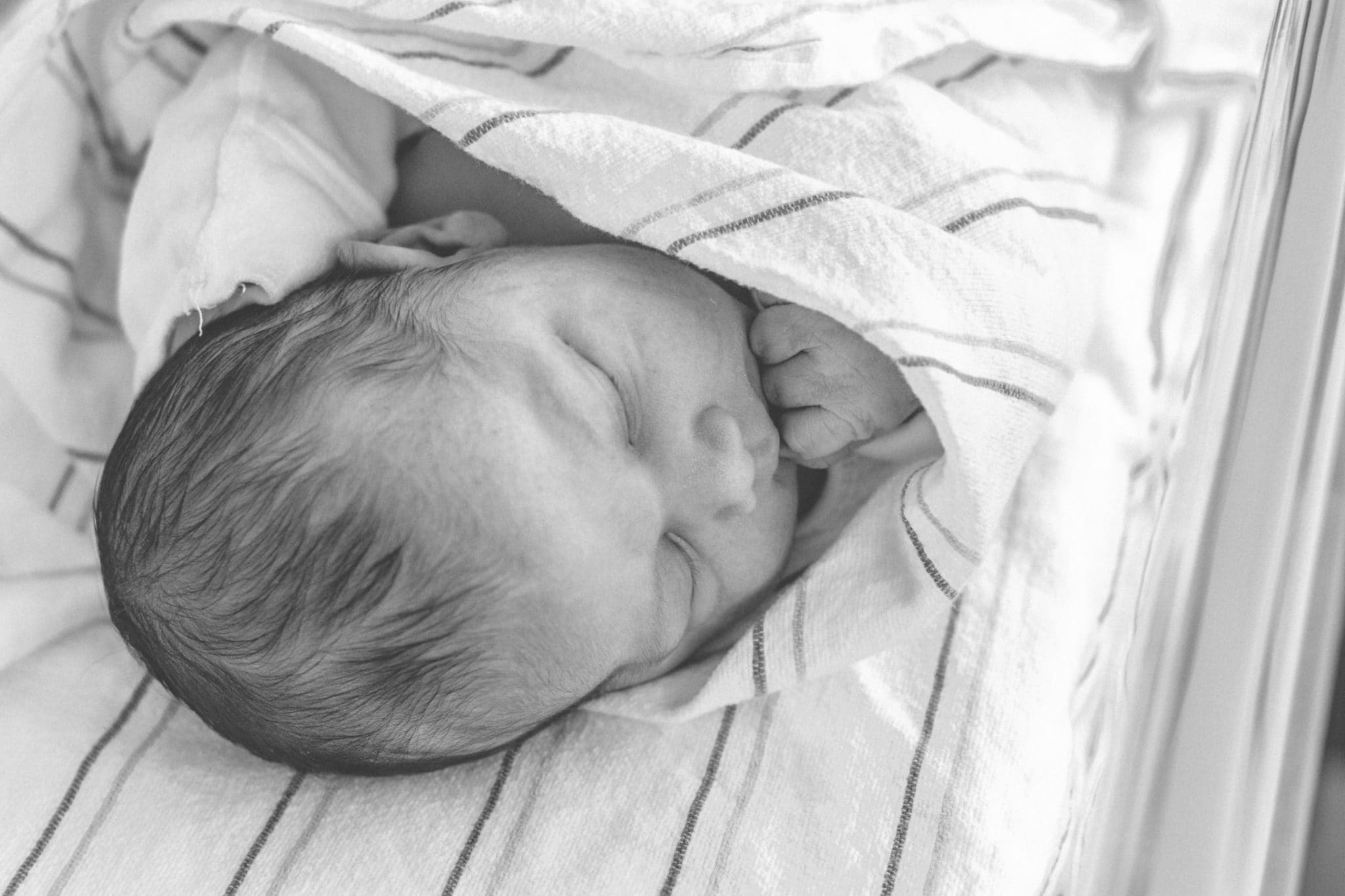 baby wrapped in blanket