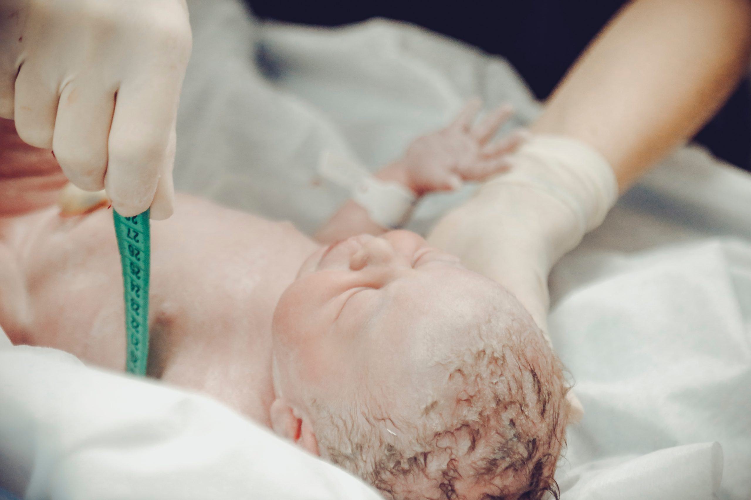Can overventilation in NICUs cause birth injuries?